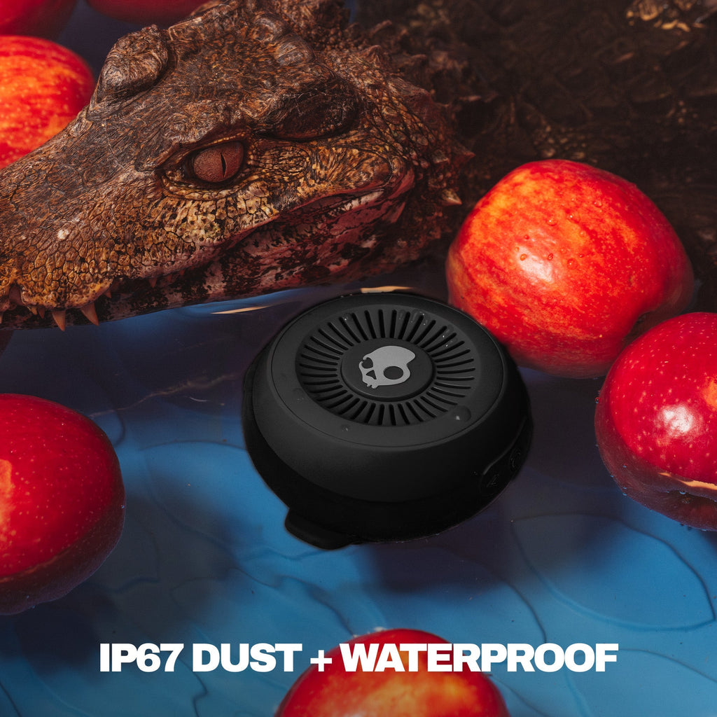 Black waterproof device surrounded by red apples with a lizard in the background, featuring 'IP67 DUST + WATERPROOF' text. | True Black