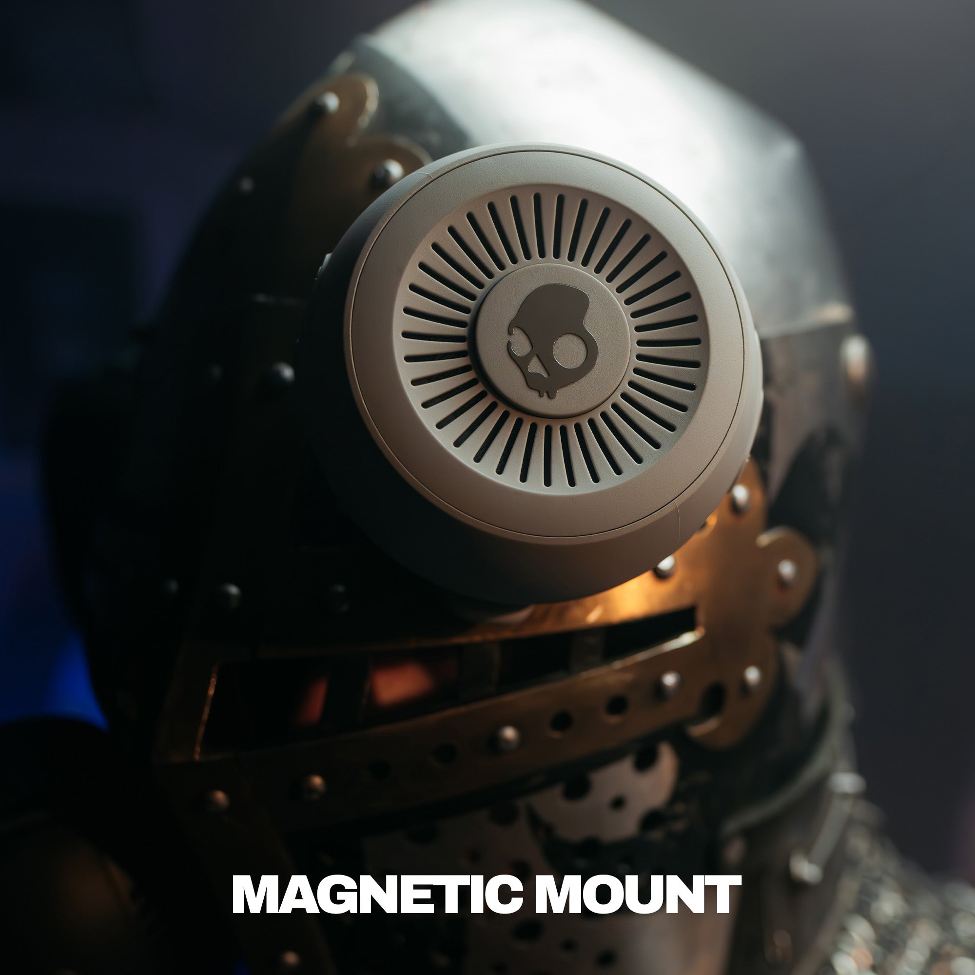 Metallic helmet with a central circular component labeled 'Magnetic Mount' on a dark background. | Cement