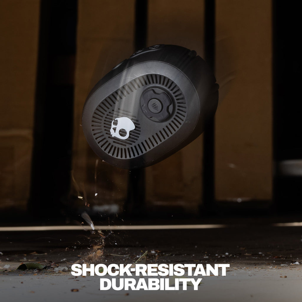 Black speaker with water splashing around it, labeled 'Shock Resistant Durability'. | True Black