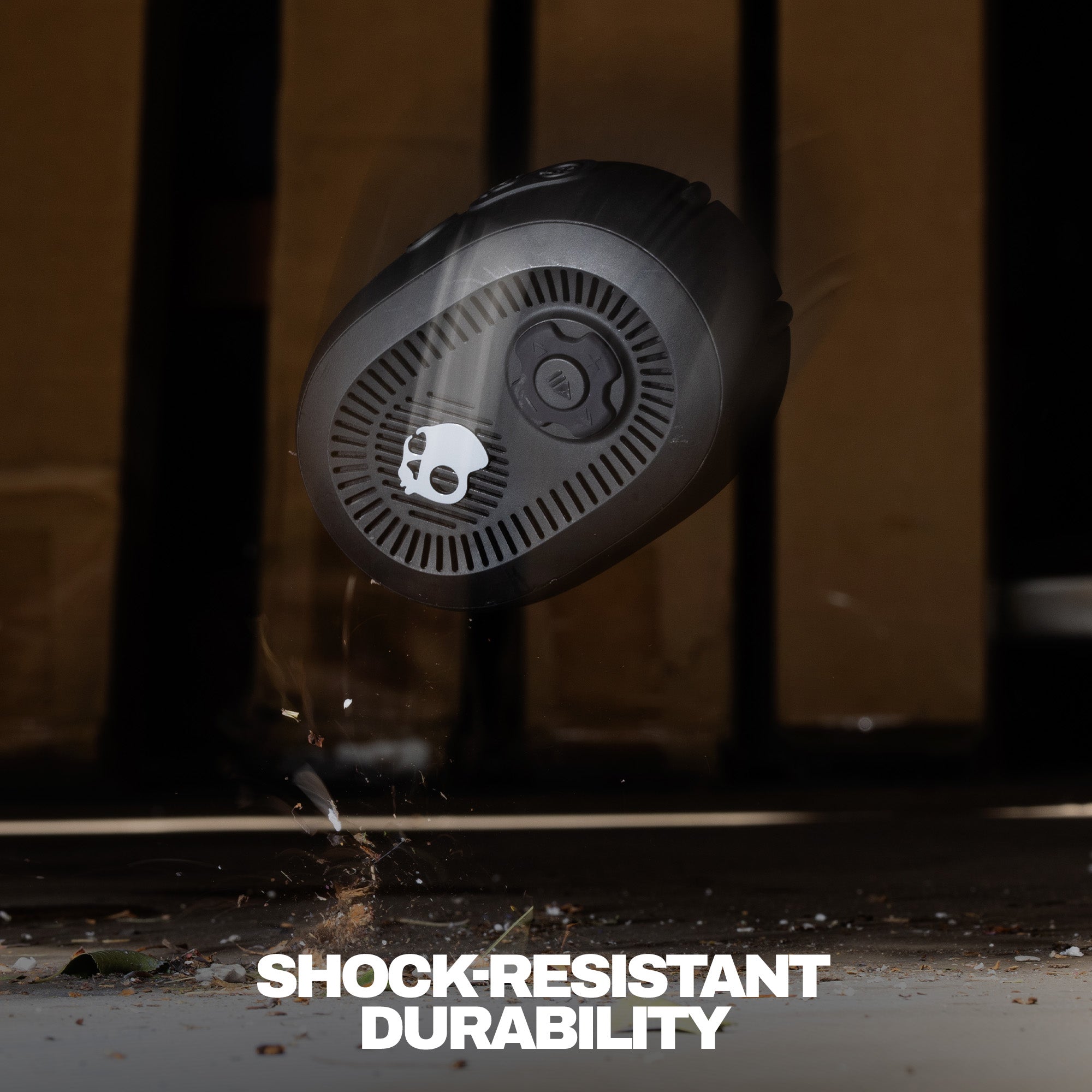 Black speaker with water splashing around it, labeled 'Shock Resistant Durability'. | True Black