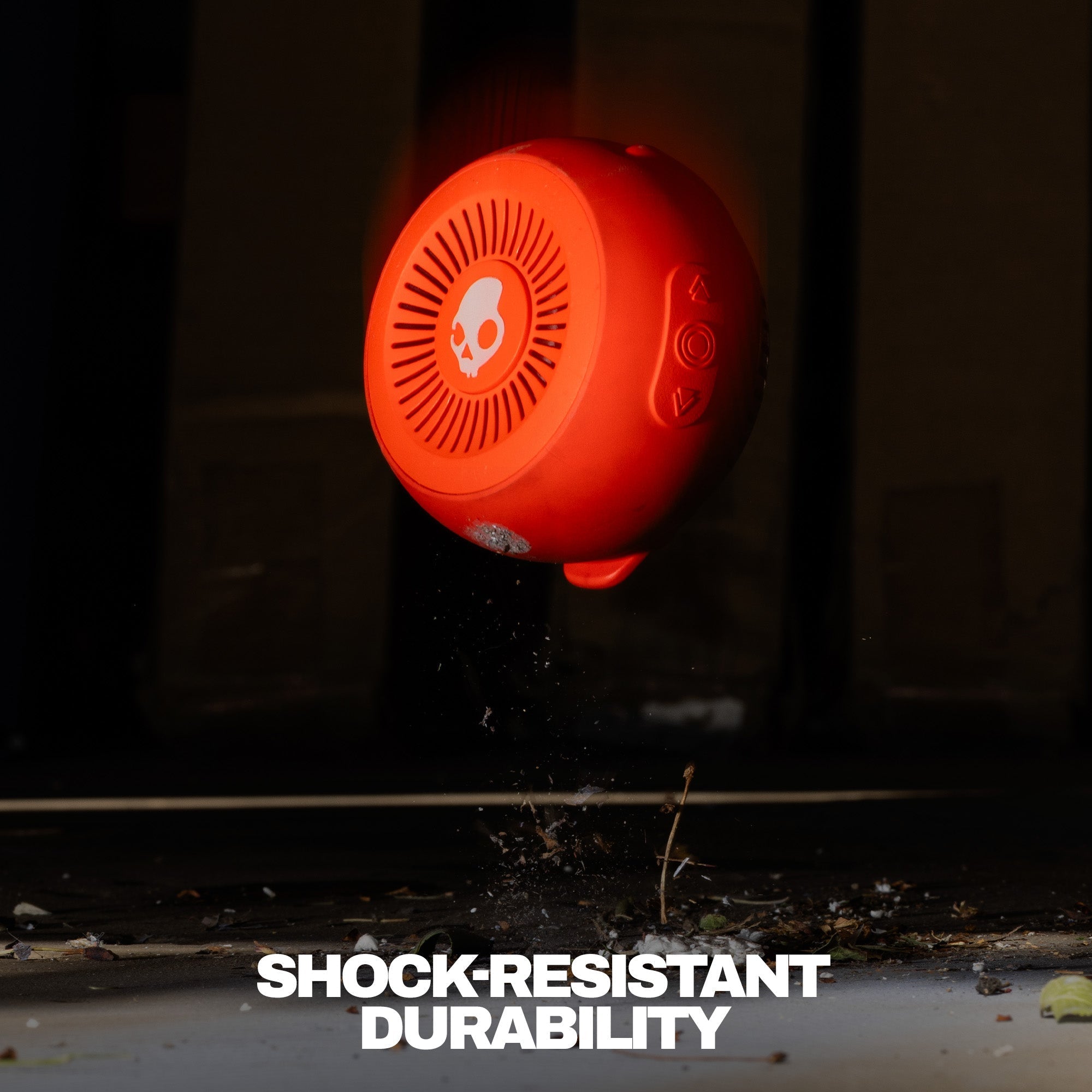 Orange shock-resistant device with durability text on a dark background | Plasma