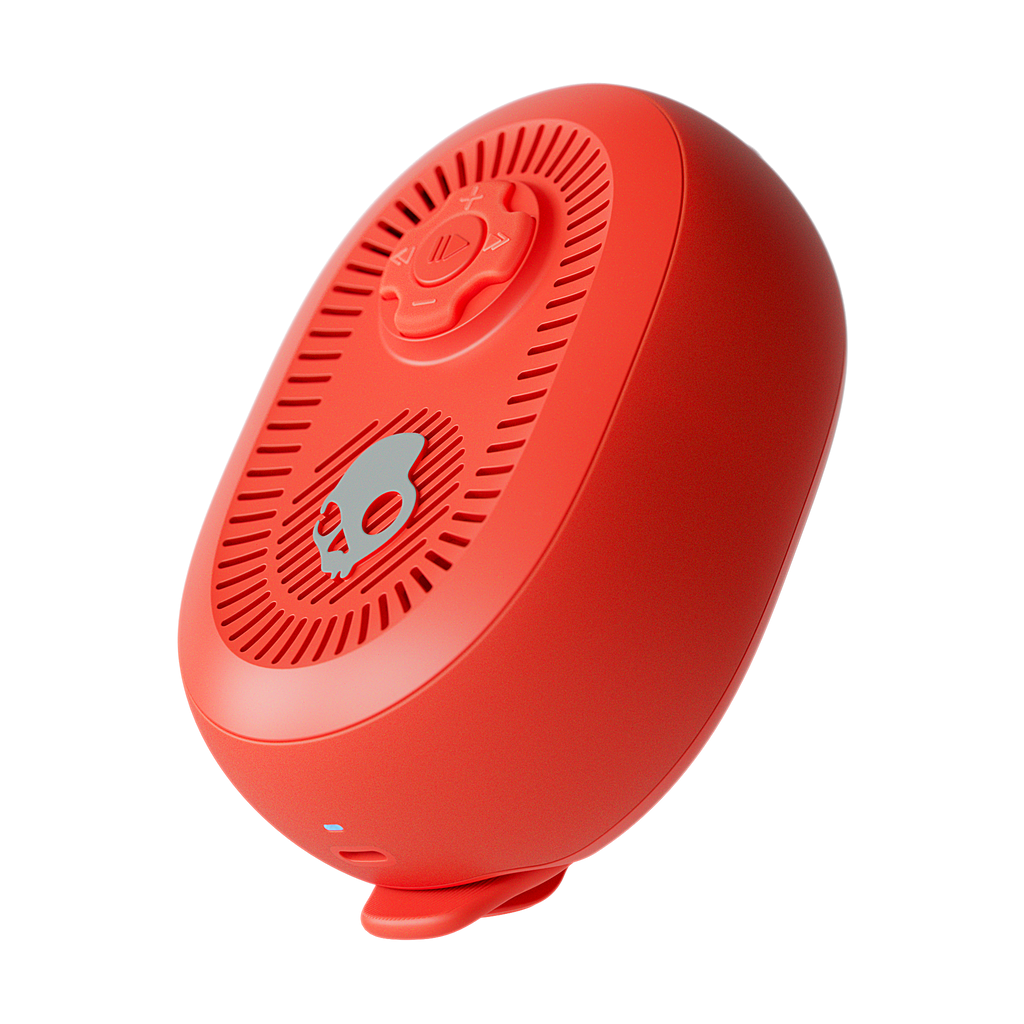 Red portable speaker on a white background | Plasma
