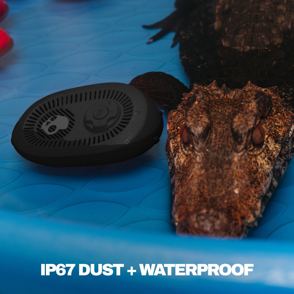 Black waterproof device on a blue surface with text 'IP67 DUST + WATERPROOF'. | True Black