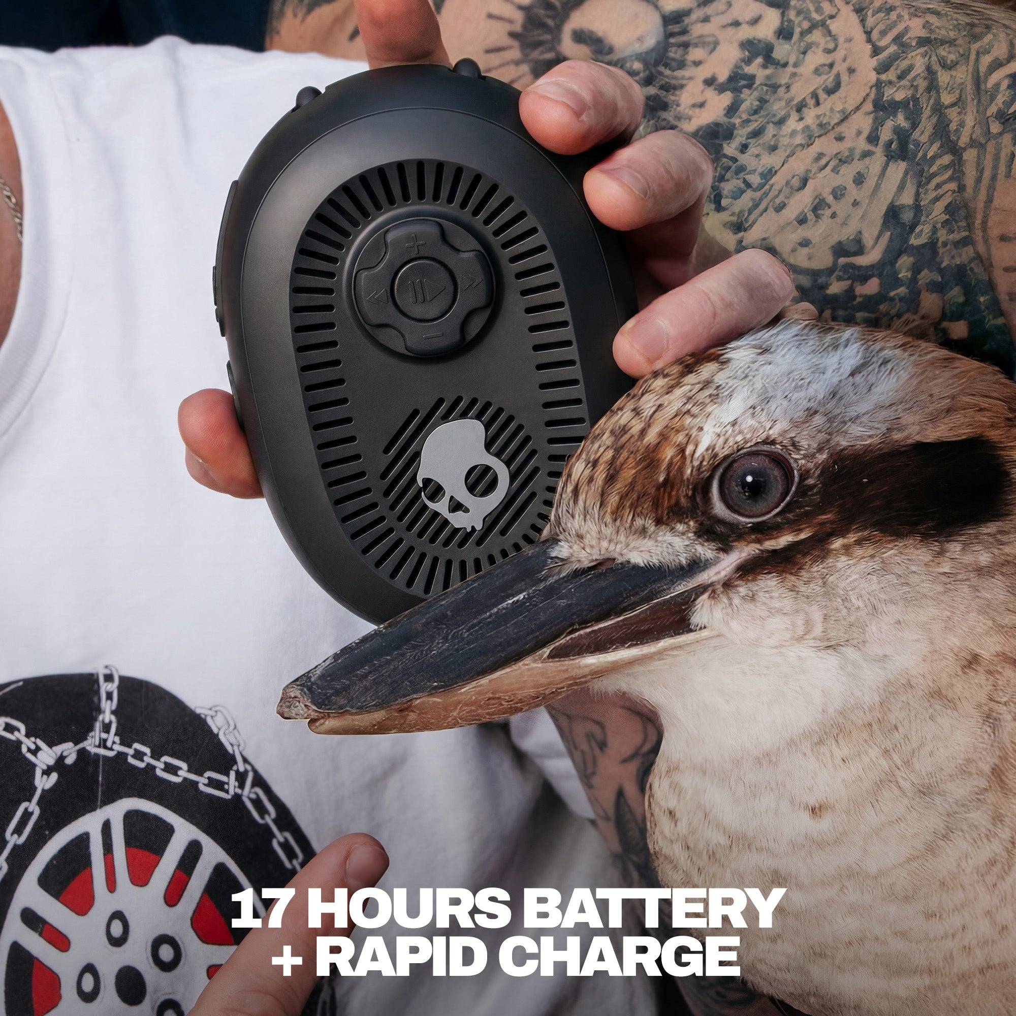 Person holding a black device with a bird by, emphasizing battery life and rapid charge feature. | True Black